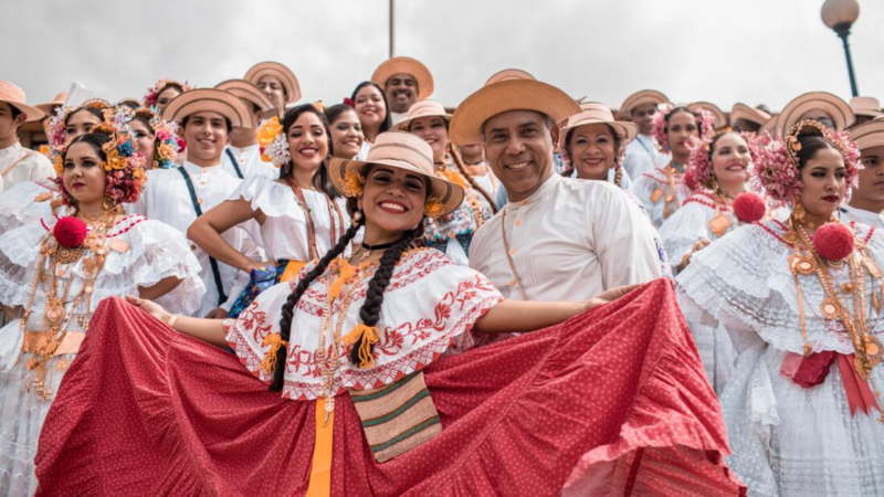 A South American guide team is dressed in traditional folk costumes