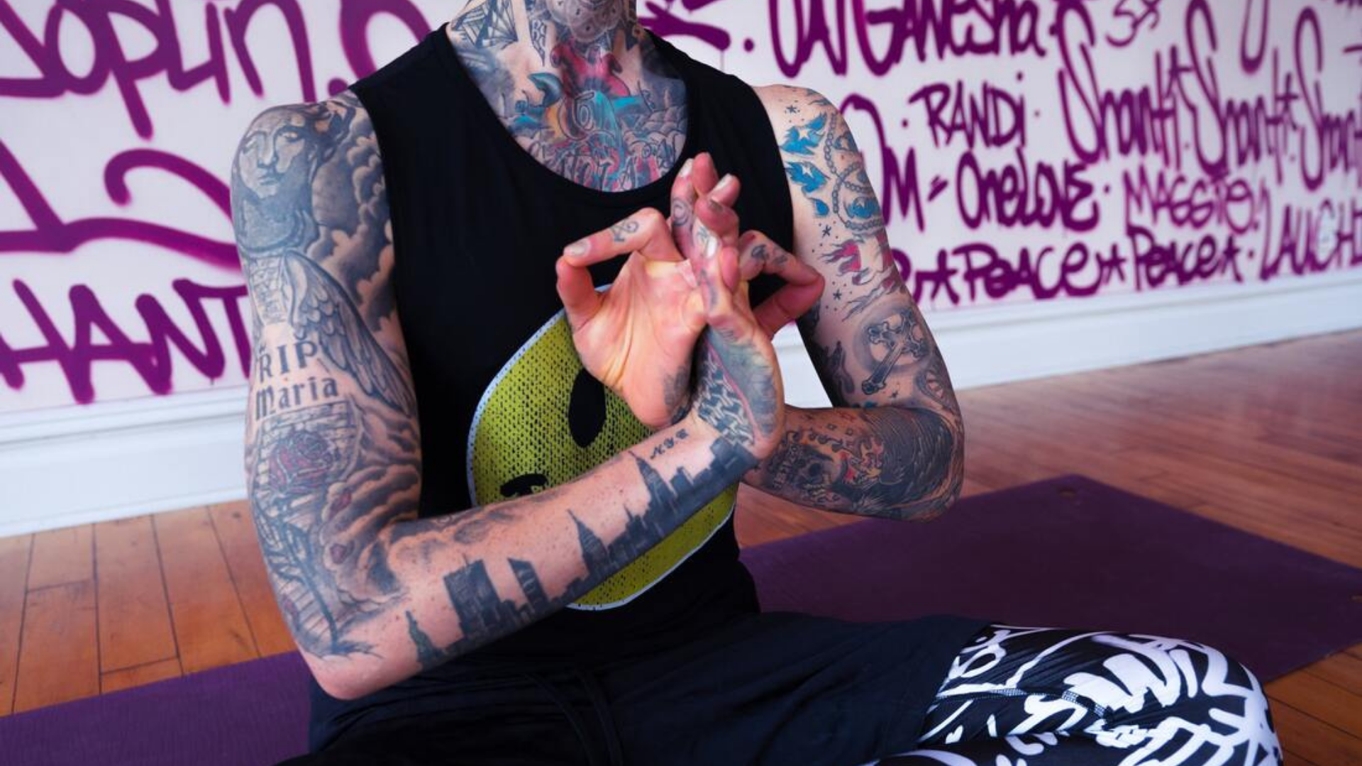 A tattooed tour guide does yoga to let go of a bad review